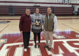 Coach Terry Canova and Will Phillips presents Greene & Phillips Player of the Week to Ansleigh Ishee