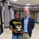 Stephen Collins presents Player of the Week Award to Wrestler, Kalyse Hill